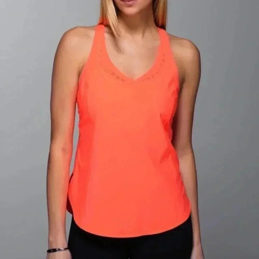 Lululemon "IN A FLASH" Tank Top loose fit coral
Orange sz large 12 racer back